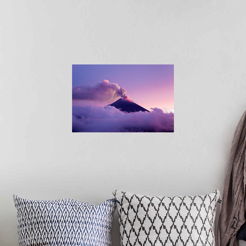 A bohemian room featuring The Tungurahua volcano erupting at twilight.