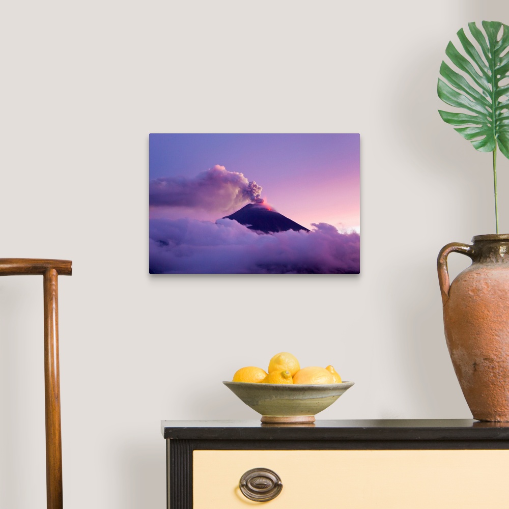 A traditional room featuring The Tungurahua volcano erupting at twilight.