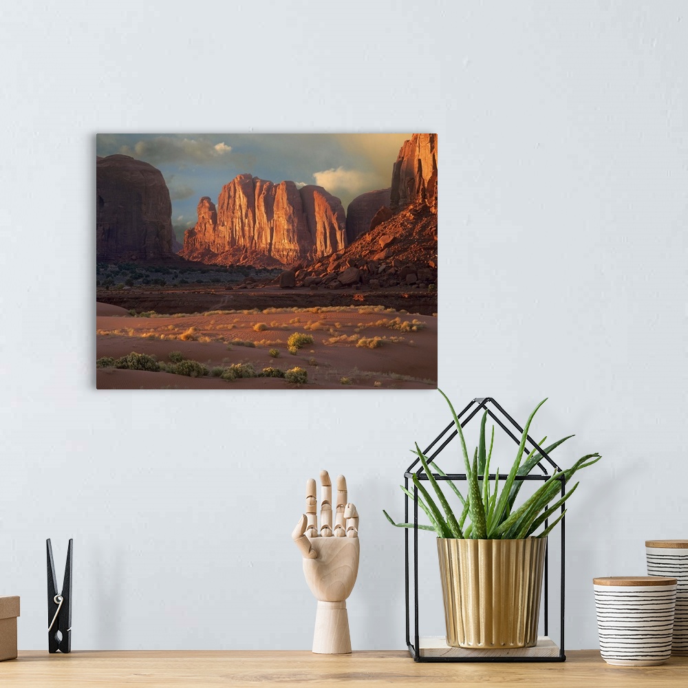 A bohemian room featuring Camel Butte rising from the desert floor, Monument Valley, Arizona