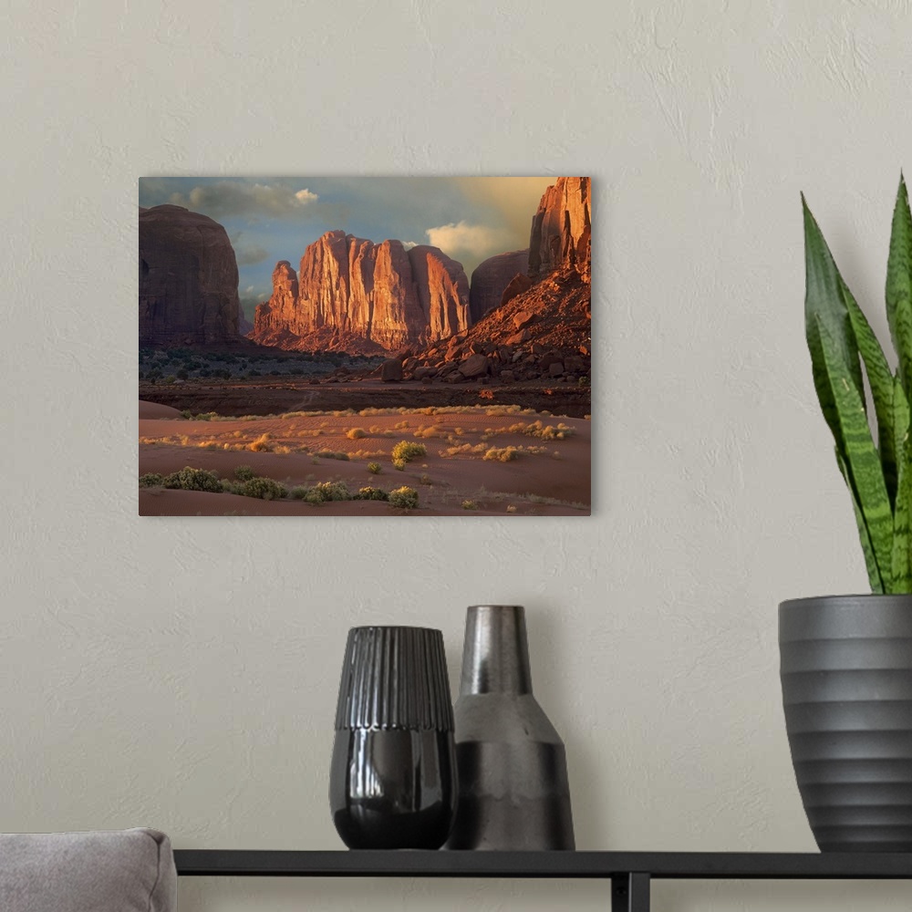 A modern room featuring Camel Butte rising from the desert floor, Monument Valley, Arizona