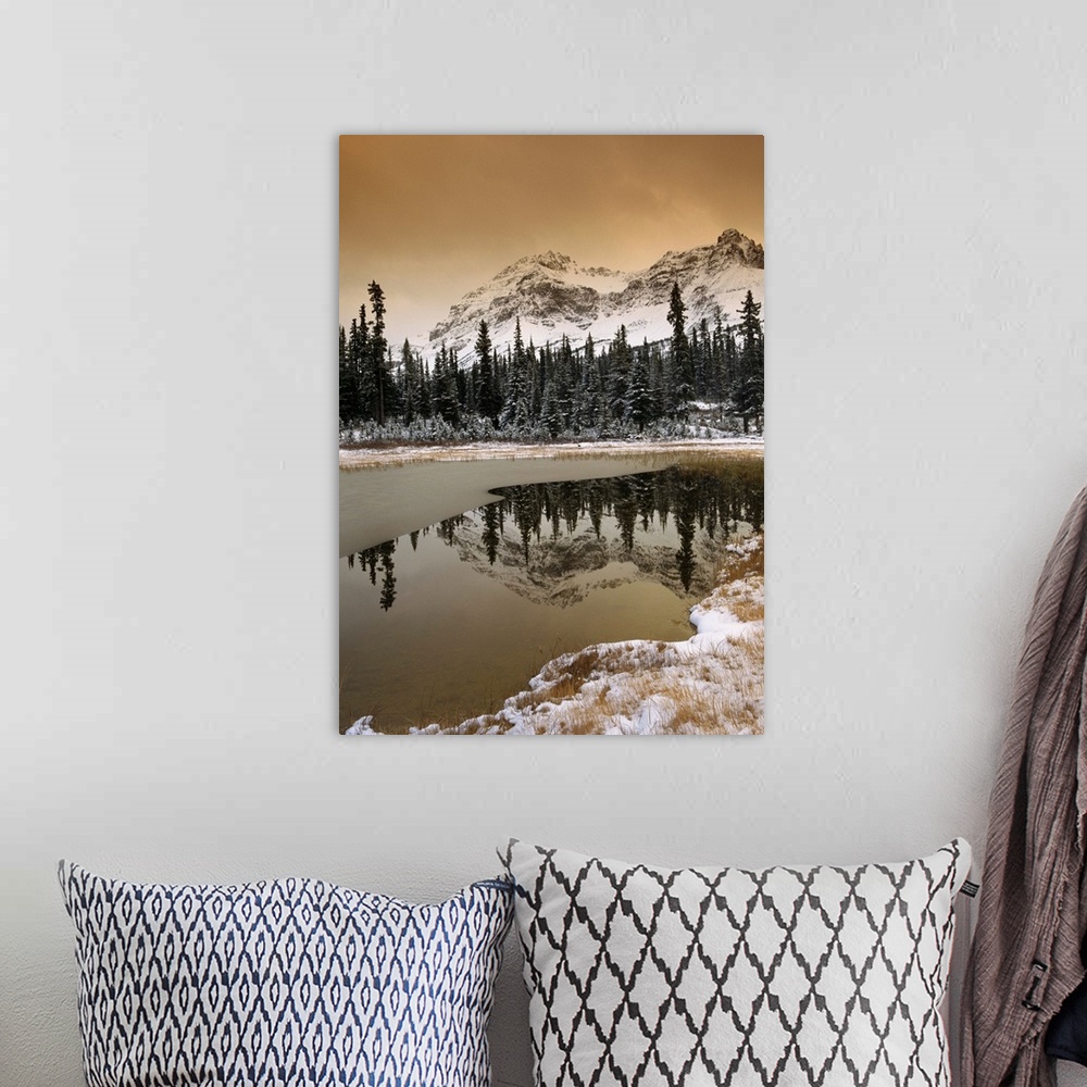 A bohemian room featuring Canadian Rocky Mountains dusted in snow, Banff National Park, Alberta, Canada