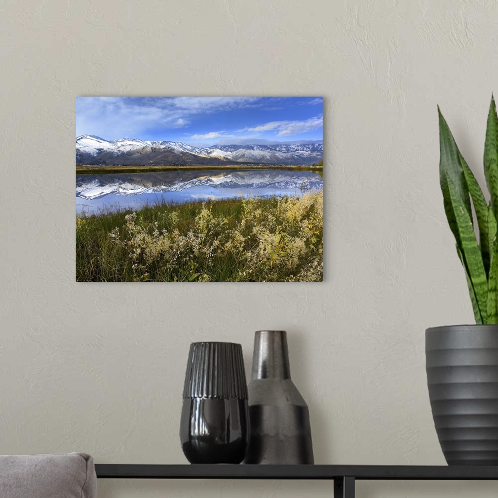 A modern room featuring Carson Range reflected in Washoe Lake, Nevada