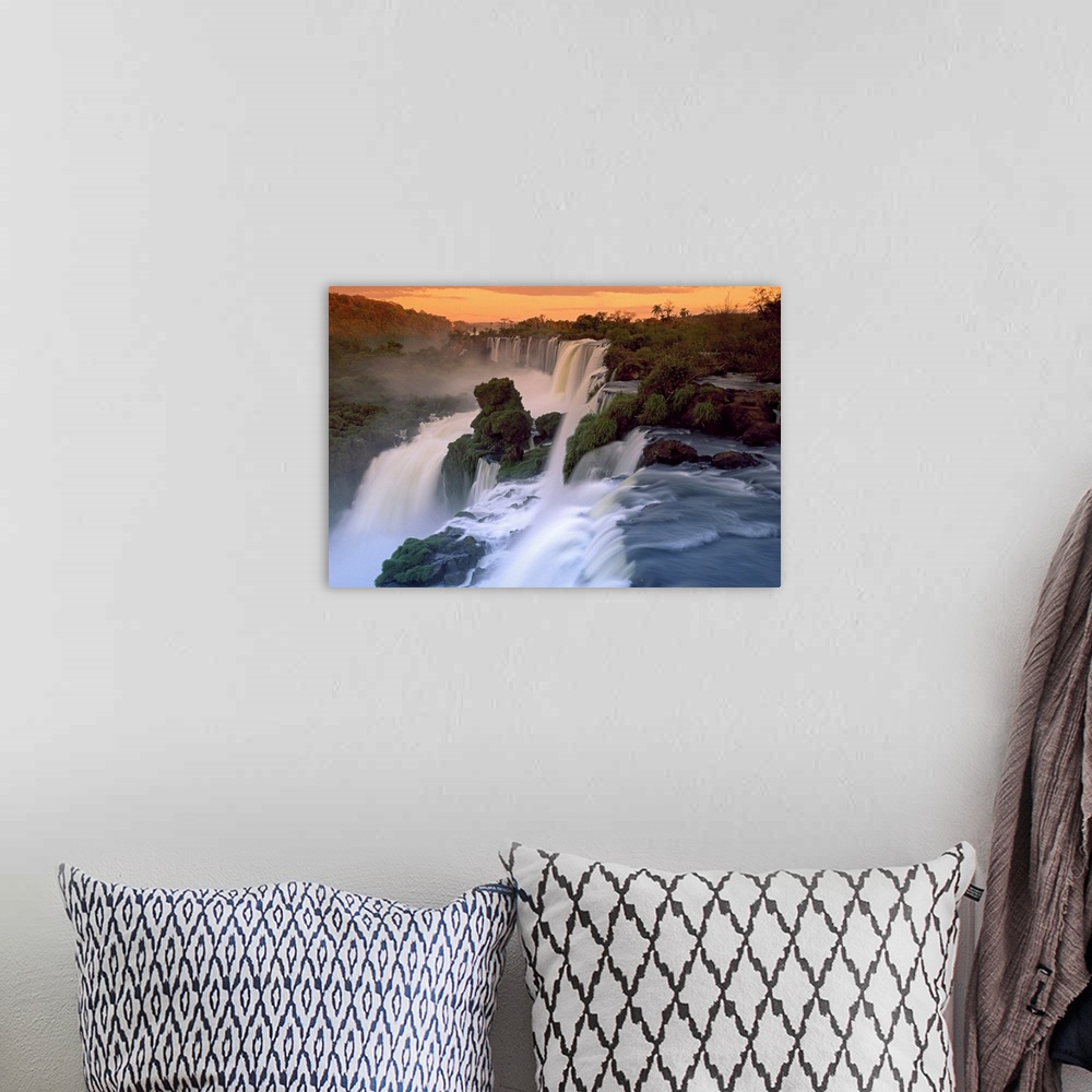 A bohemian room featuring This wall art is a landscape photograph taken from above of an enormous South American waterfall ...