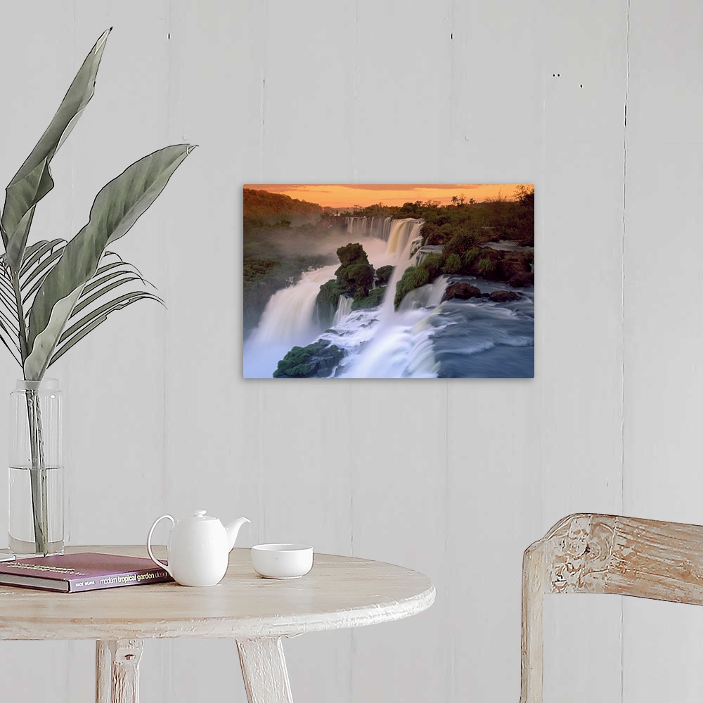A farmhouse room featuring This wall art is a landscape photograph taken from above of an enormous South American waterfall ...
