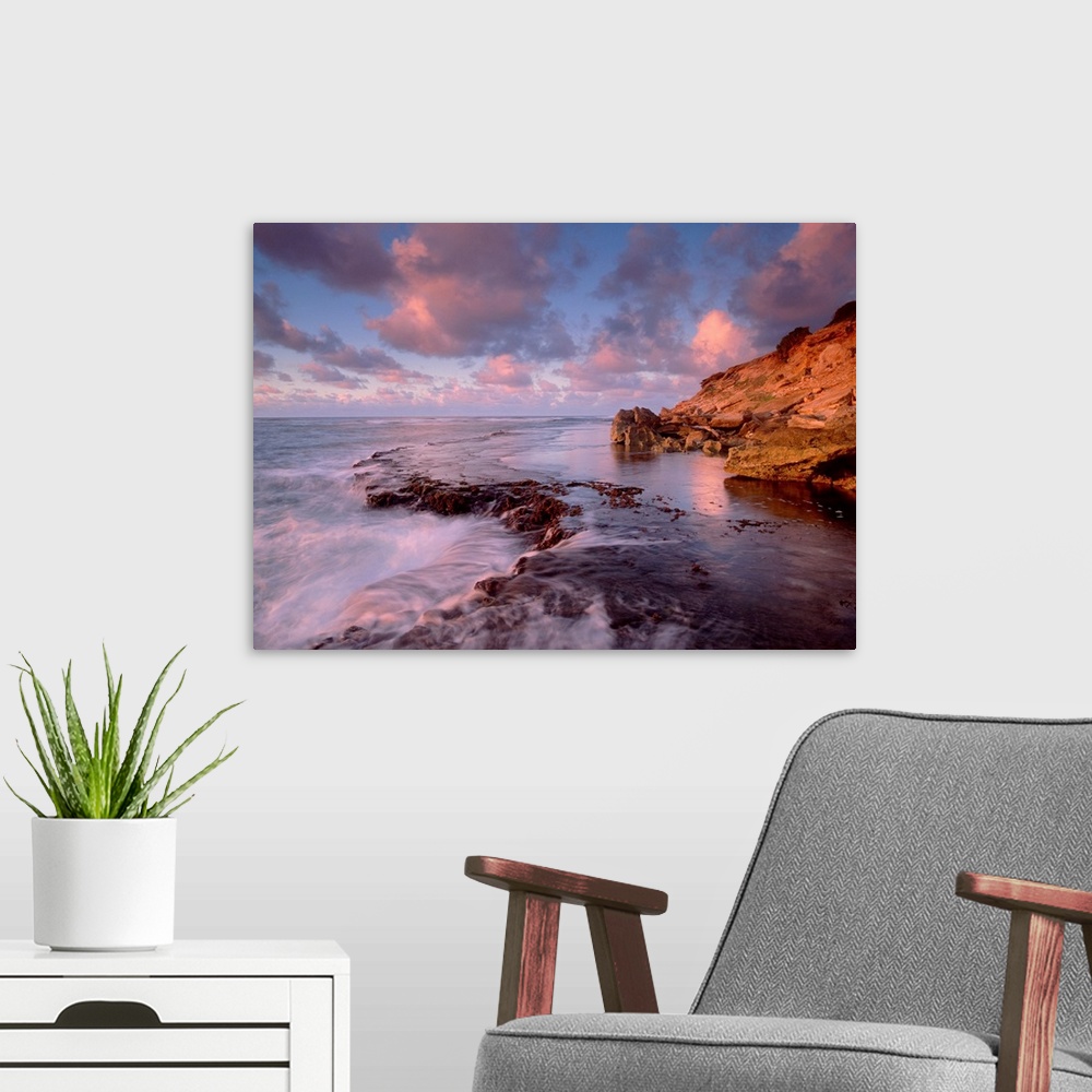 A modern room featuring Dawn from the base of Makewehi Cliffs near Shipwreck Beach, Keoneloa Bay, Kauai, Hawaii