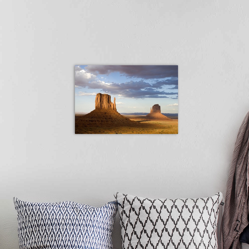 A bohemian room featuring East and West Mittens, Monument Valley, Arizona
