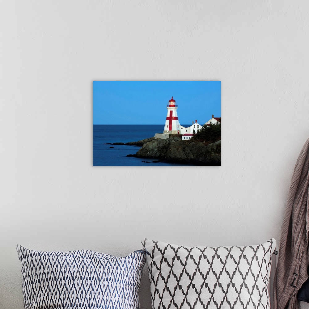 A bohemian room featuring Campobello Lighthouse, Gulf of Maine,dusk