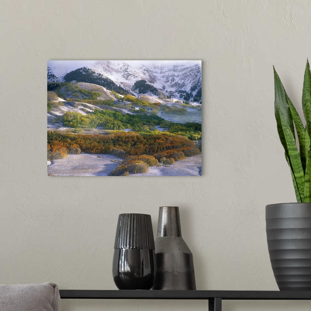 A modern room featuring Elk Mountains with dusting of snow, Colorado