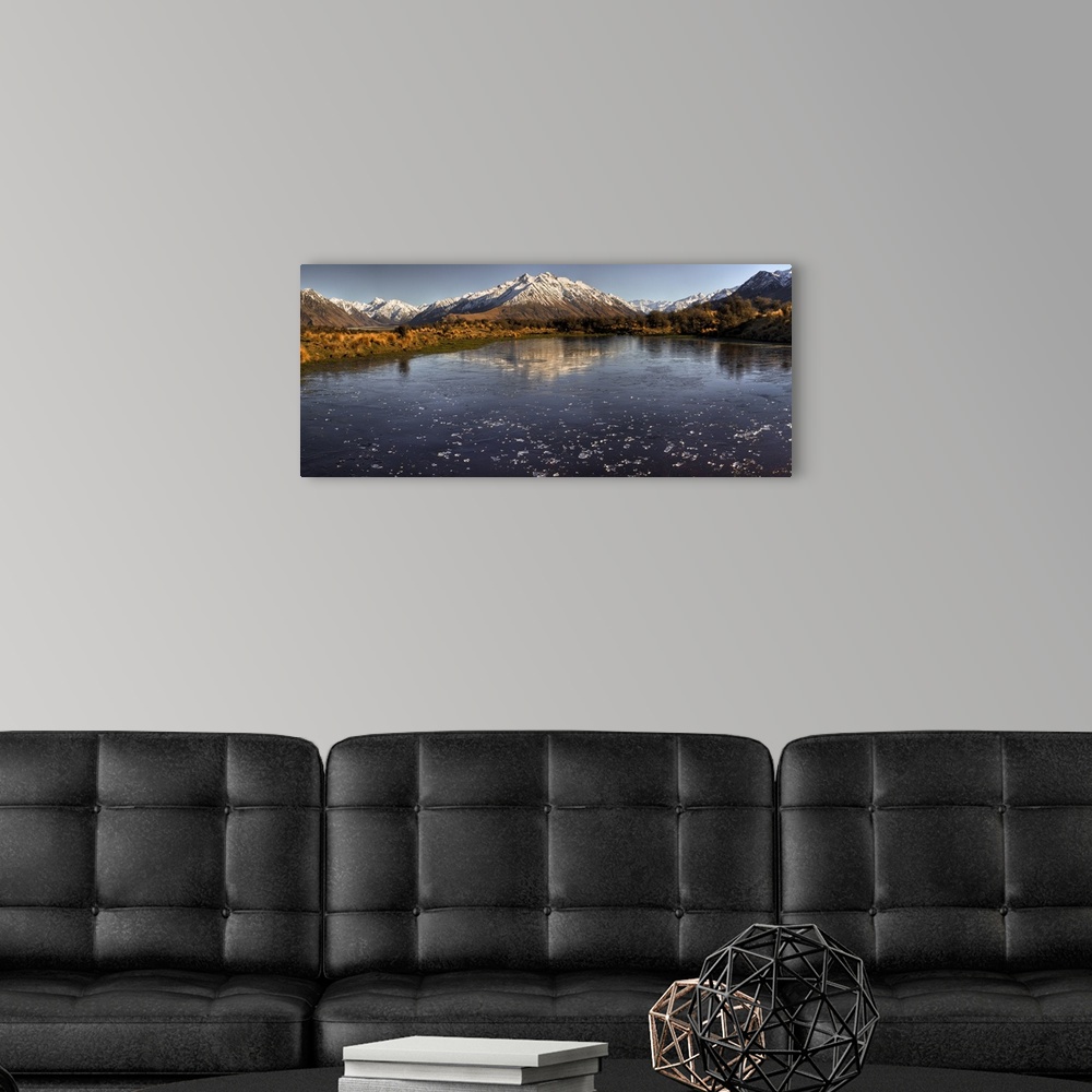A modern room featuring Frozen tarn covered in ice chips, panorama looking up Rangitata river valley, from Mt Sunday, (Ed...