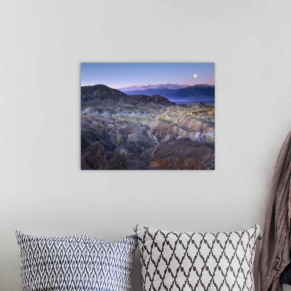 A bohemian room featuring Full moon rising over Zabriskie Point, Death Valley National Park, California