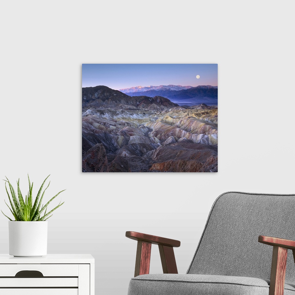 A modern room featuring Full moon rising over Zabriskie Point, Death Valley National Park, California