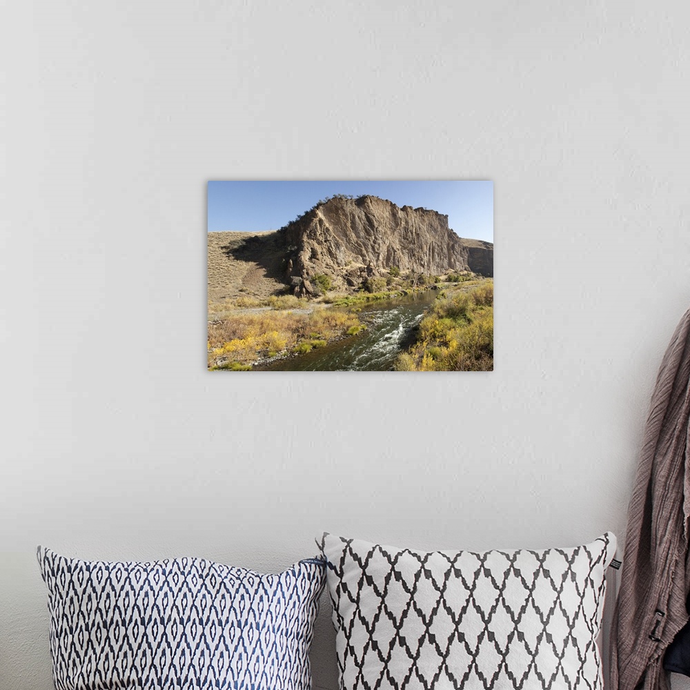 A bohemian room featuring Goose Rock, a geologic formation above the John Day River in the John Day Fossil Beds National Mo...