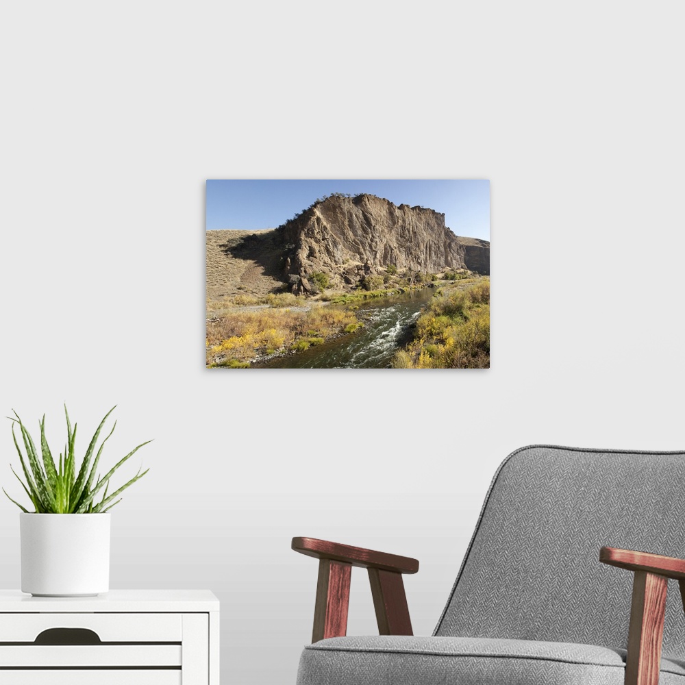 A modern room featuring Goose Rock, a geologic formation above the John Day River in the John Day Fossil Beds National Mo...