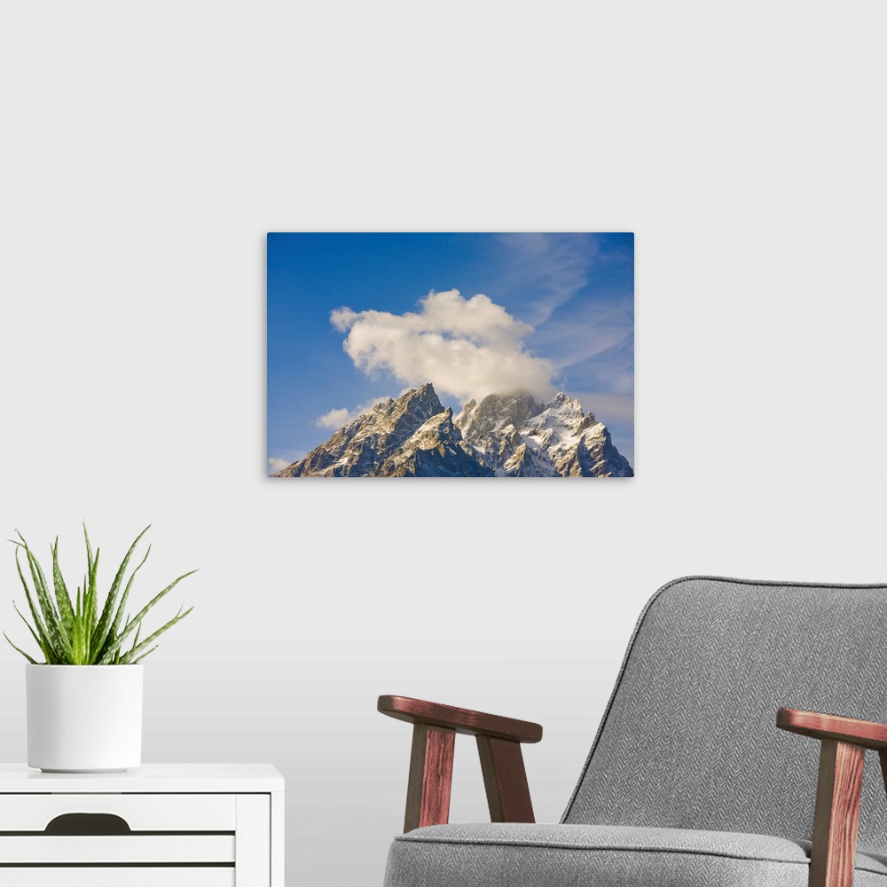 A modern room featuring Grand Teton Peak and Cumulus Clouds