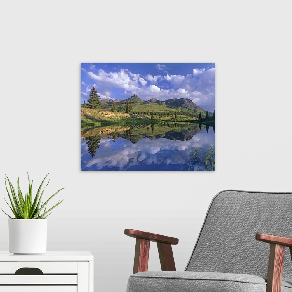 A modern room featuring Grand Turk and Sultan Mountain reflected in Molas Lake, Colorado