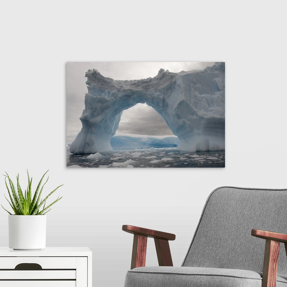 A modern room featuring Iceberg with a natural arch, Antarctic Peninsula, Antarctica