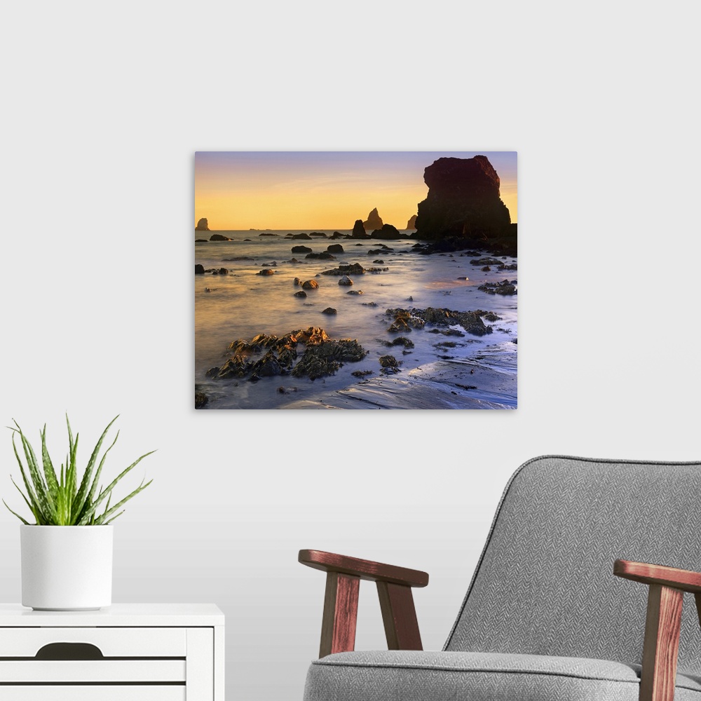 A modern room featuring Lone Beach at sunset, Oregon