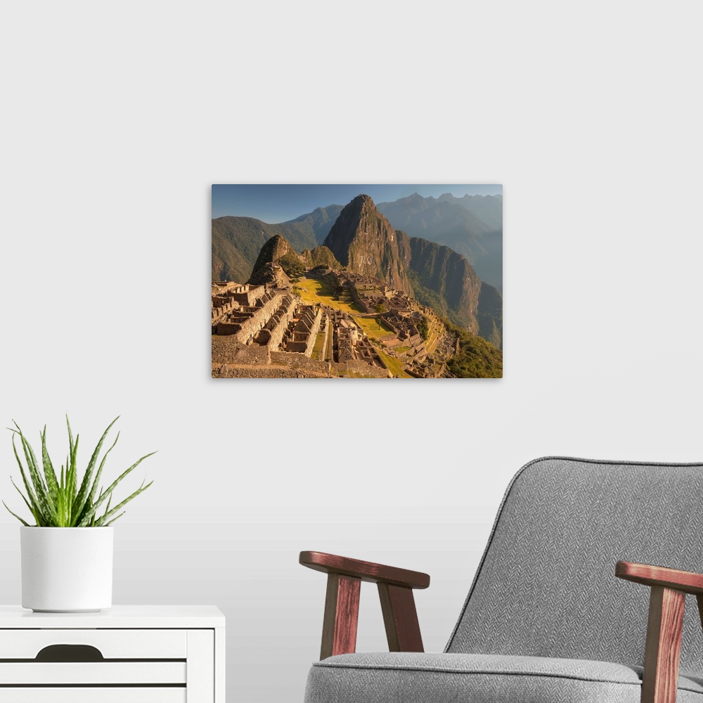 A modern room featuring Macchu Picchu, 'lost' city of the Incas, dawn above Urubamba valley, sacred valley of the Incas, ...