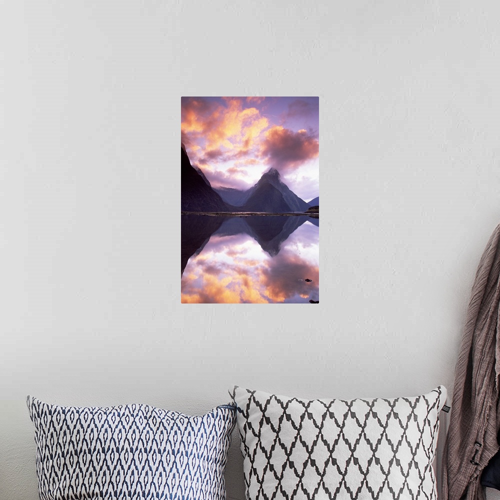A bohemian room featuring Big, vertical photograph of Mitre Peak, reflecting in the still water of Milford Sound, as the su...