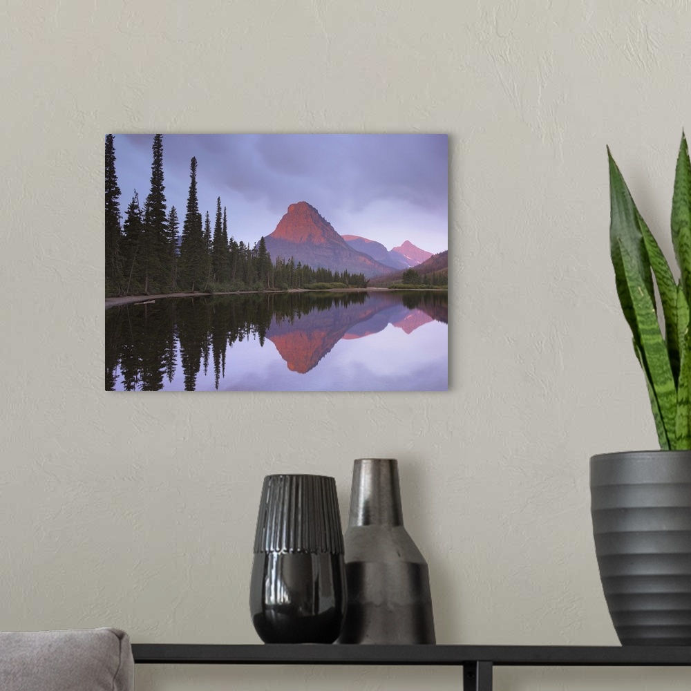 A modern room featuring Mount Sinopah reflected in Two Medicine Lake, Glacier National Park, Montana
