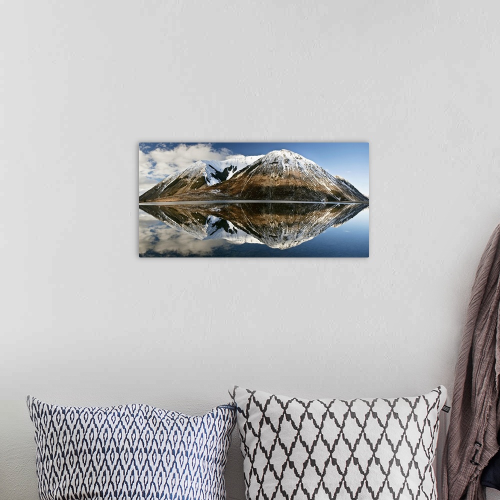 A bohemian room featuring Mountains reflecting in Lake Pearson in winter, Castle Hill Basin, Canterbury, New Zealand