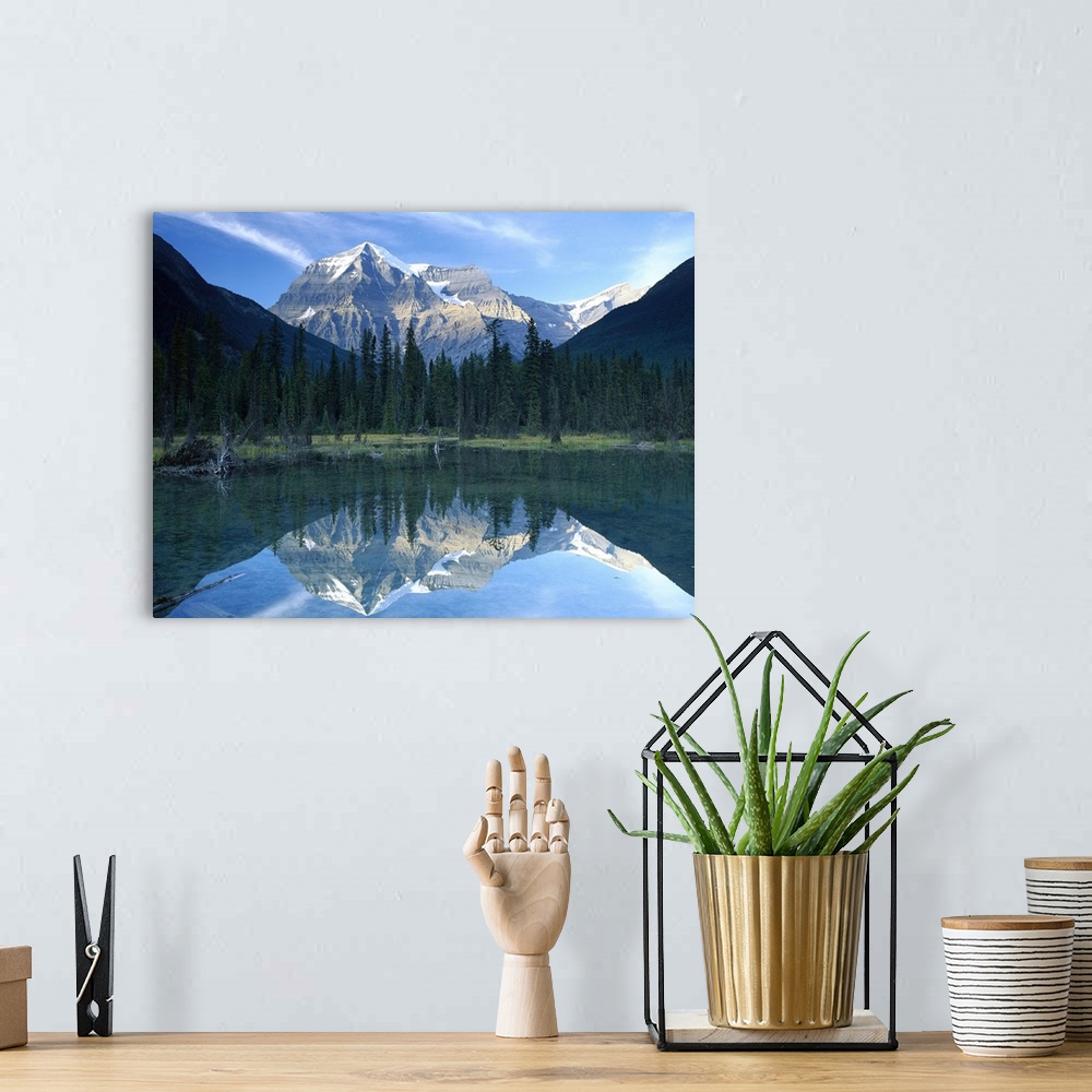 A bohemian room featuring Mt Robson reflected in lake, British Columbia, Canada