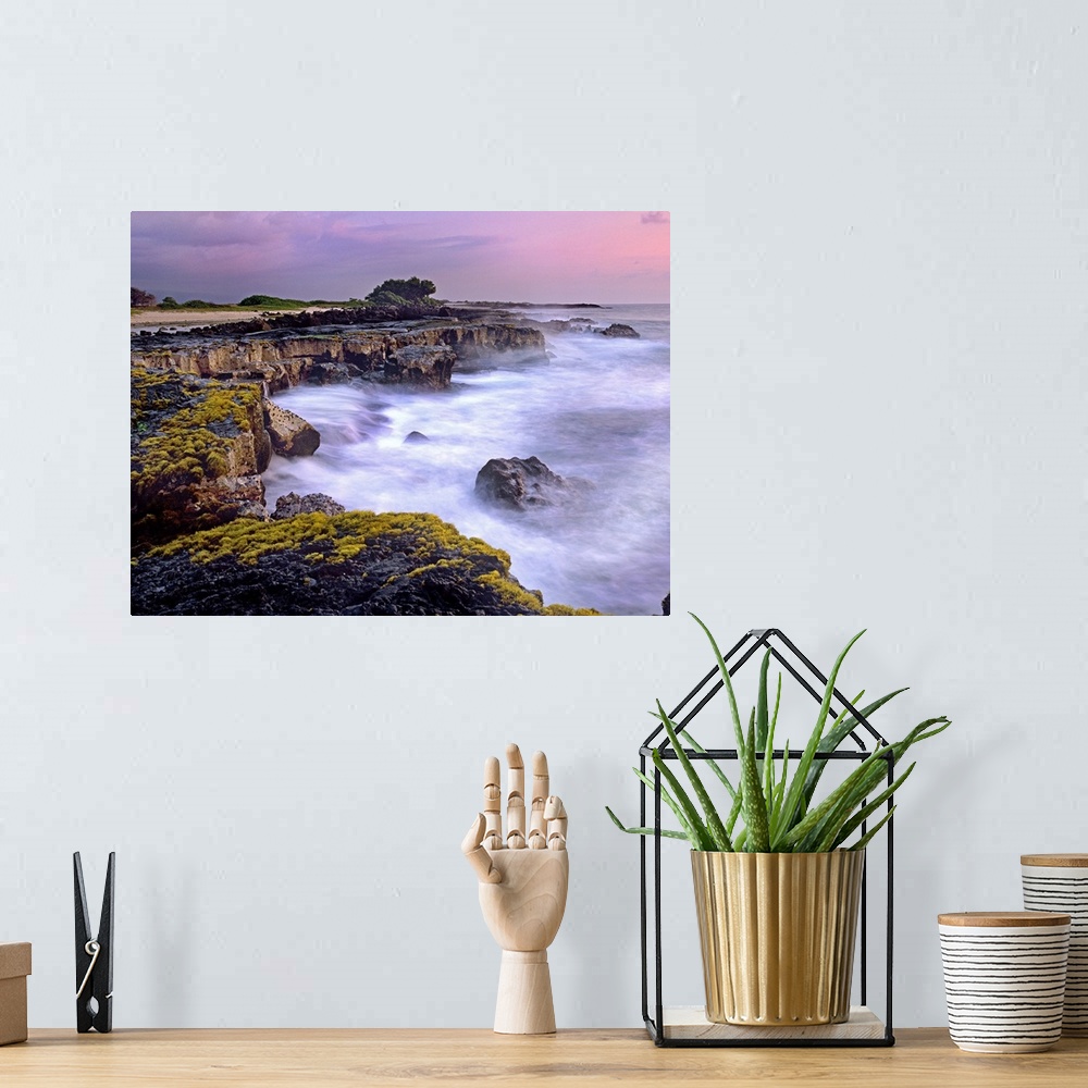 A bohemian room featuring Photograph of rocky cliff line that drops into the ocean under a cloudy sky.