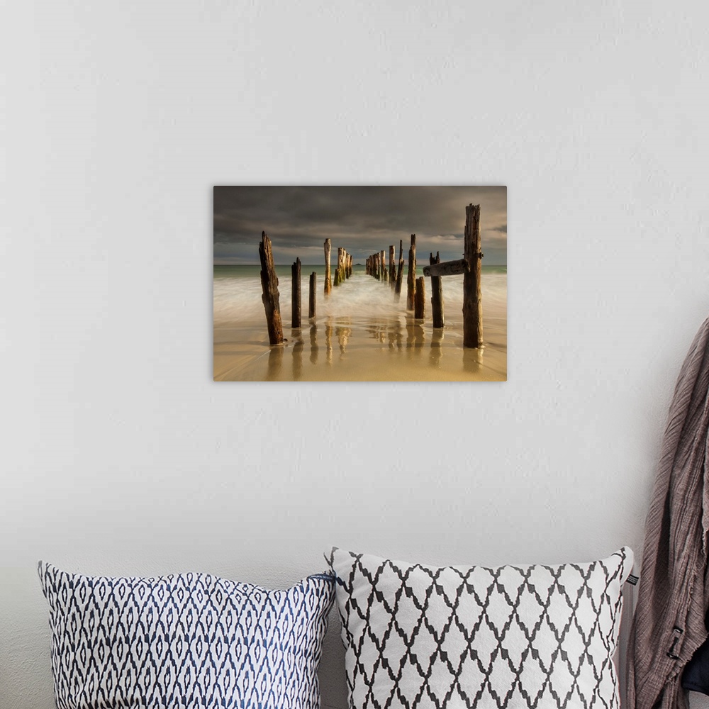 A bohemian room featuring Old wharf, evening light, St Clair beach, Dunedin, Otago