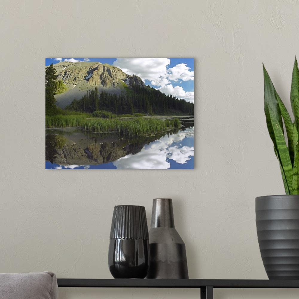 A modern room featuring Palmyra Peak reflected in Alta Lake, Colorado