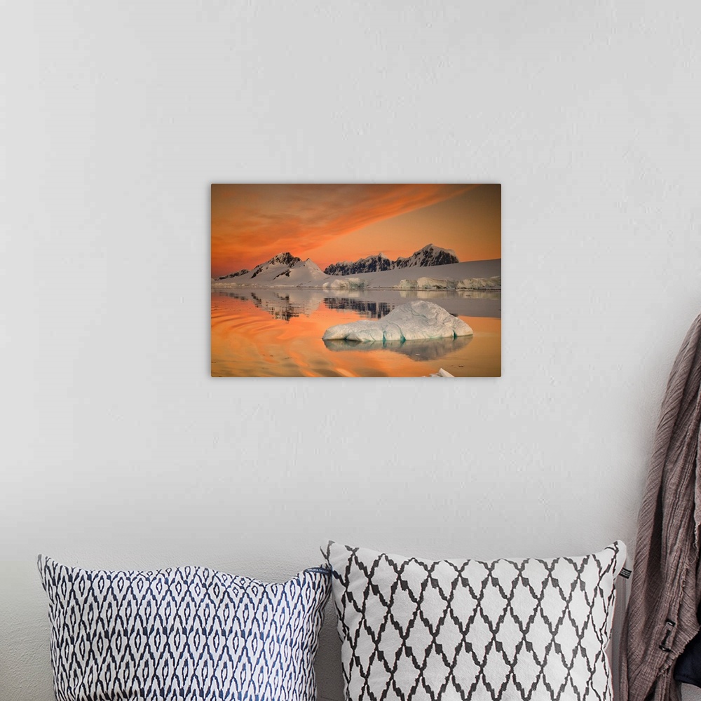 A bohemian room featuring Wiencke Island peaks, Fief Range, sunset reflection, near Port Lockroy, Antarctic Peninsula