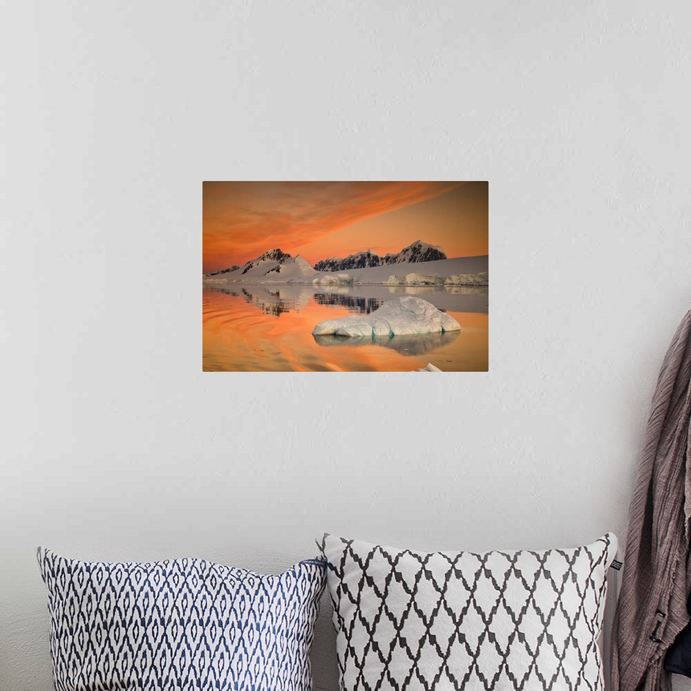 A bohemian room featuring Wiencke Island peaks, Fief Range, sunset reflection, near Port Lockroy, Antarctic Peninsula
