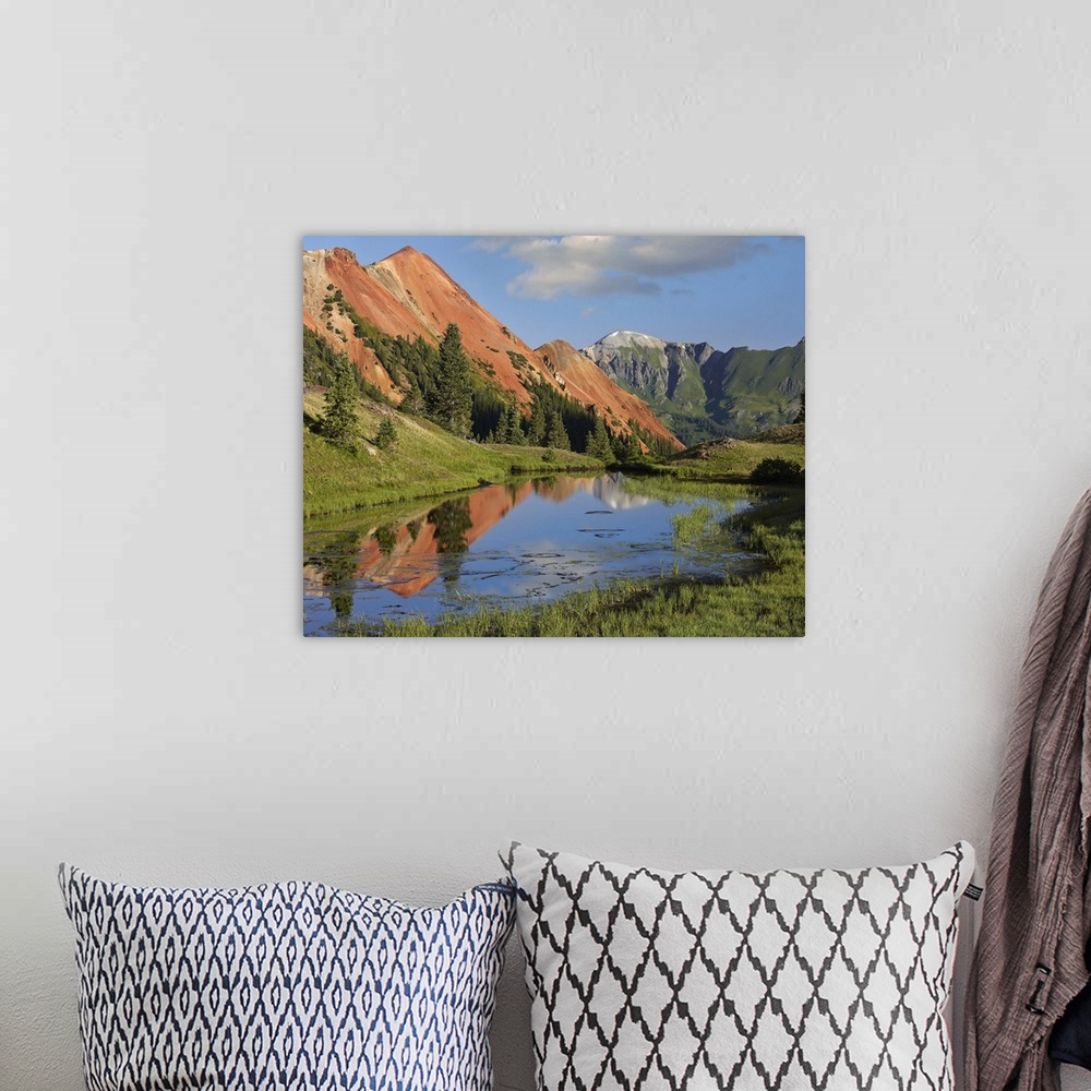 A bohemian room featuring Red Mountain gets its color from iron ore in the rock, Gray Copper Gulch, Colorado