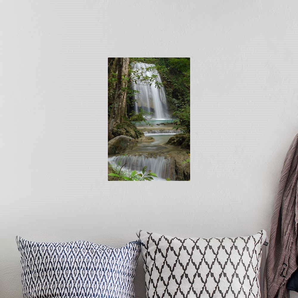 A bohemian room featuring Seven Step Waterfall in monsoon forest, Erawan National Park, Thailand