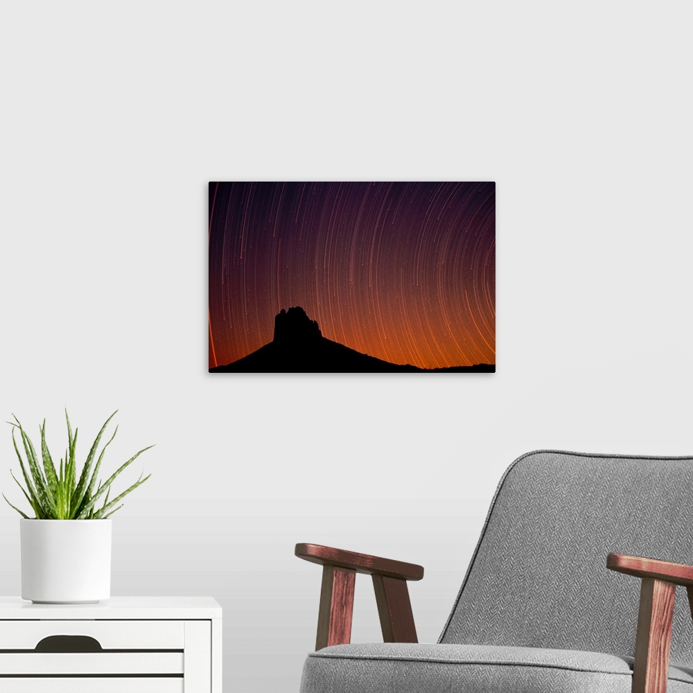 A modern room featuring Startrails over Shiprock in the four corners region of the Southwest, New Mexico