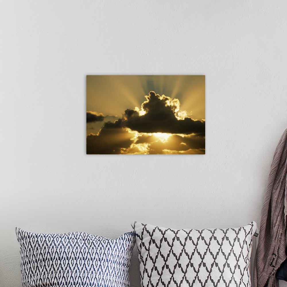 A bohemian room featuring SUN RAYS BEAM FROM BEHIND CUMULUS CLOUDS,