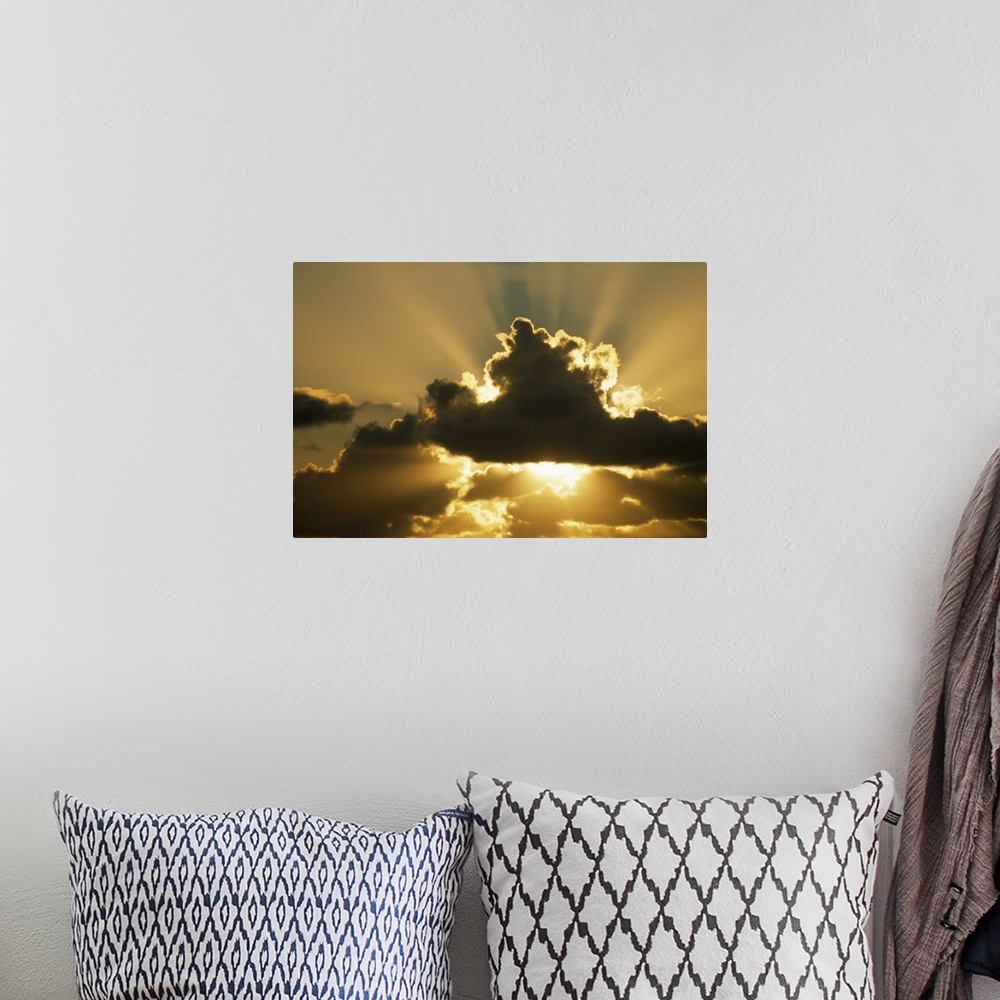 A bohemian room featuring SUN RAYS BEAM FROM BEHIND CUMULUS CLOUDS,