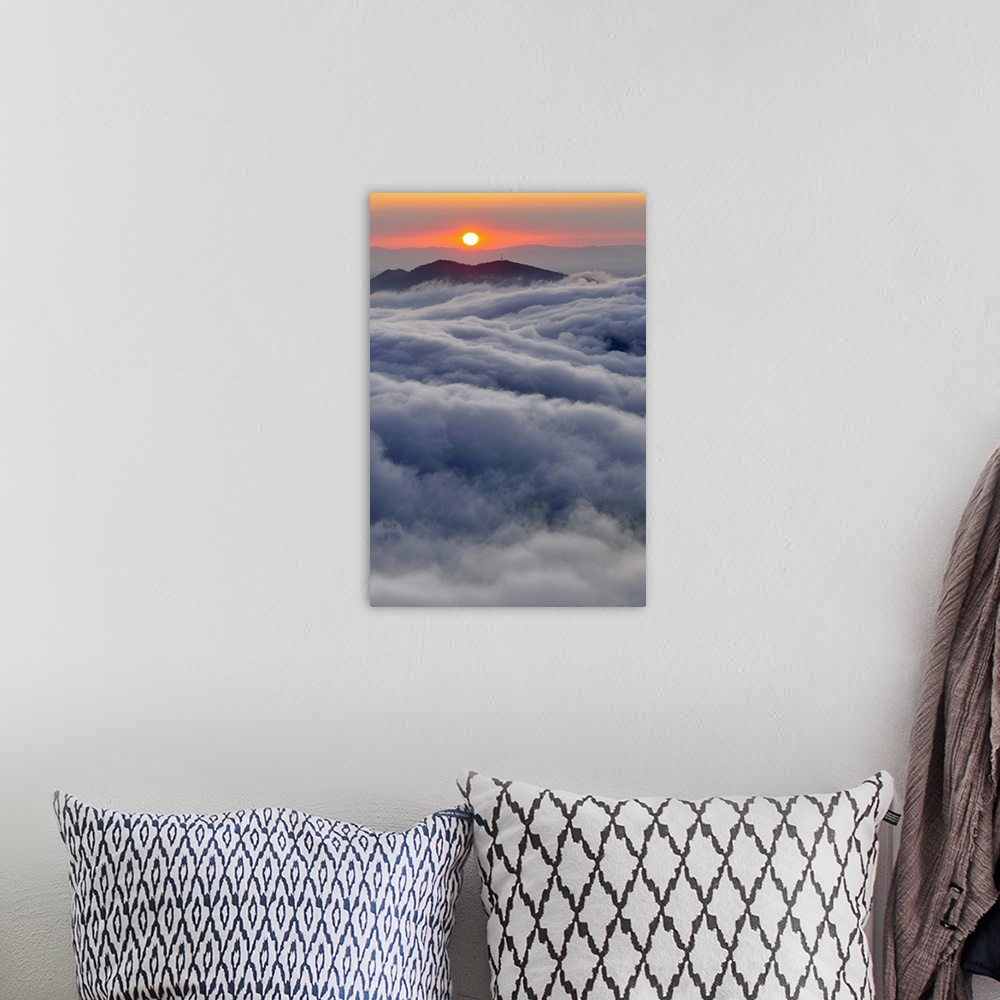 A bohemian room featuring Sunrise over mountain and clouds, Spain