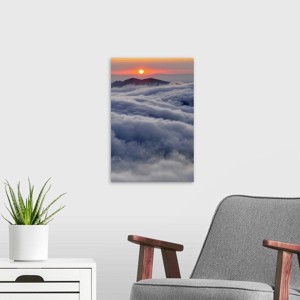 A modern room featuring Sunrise over mountain and clouds, Spain