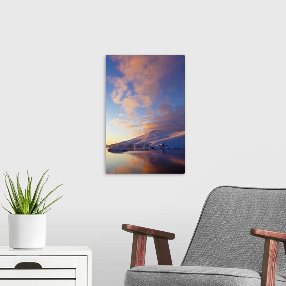 A modern room featuring Sunset over coastal mountains, Lemaire Channel, Antarctica.