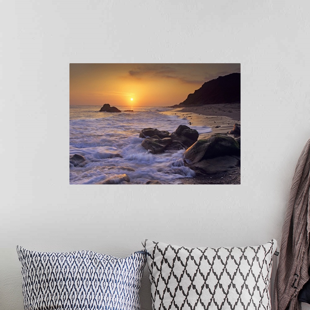 A bohemian room featuring Sunset over Leo Carillo State Beach, Malibu, California