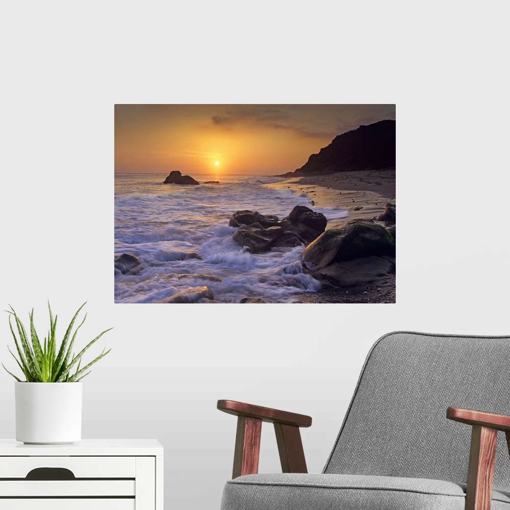 A modern room featuring Sunset over Leo Carillo State Beach, Malibu, California