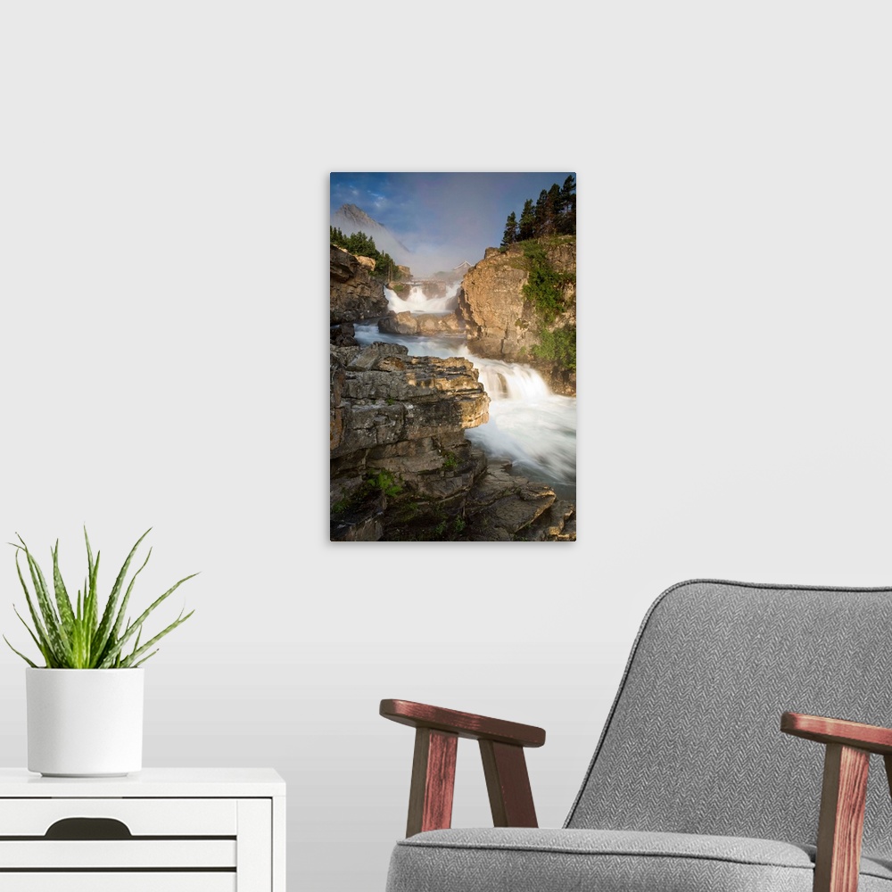 A modern room featuring Swiftcurrent Falls and Mount Grinnell at sunrise, Glacier National Park, Montana