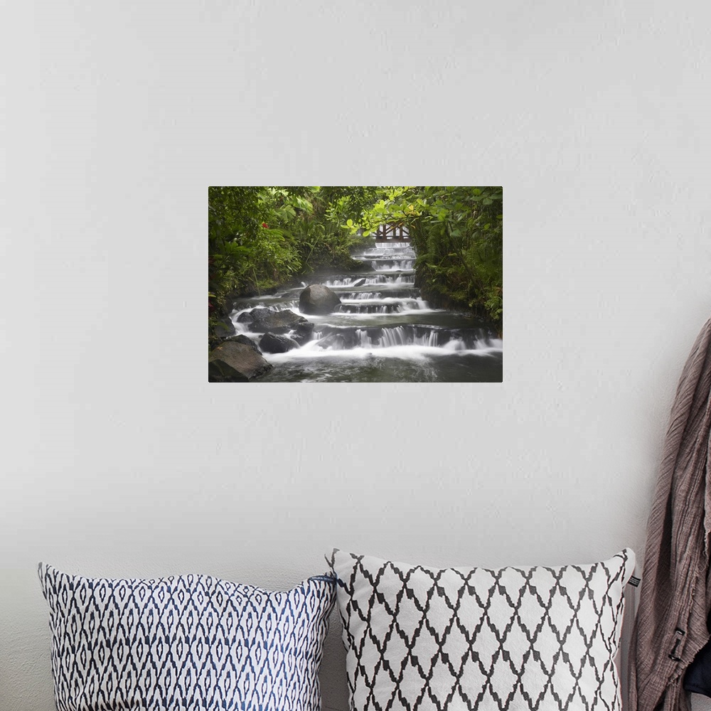 A bohemian room featuring Wall art for the home or office this landscape photograph shows a steam flowing through a forest.