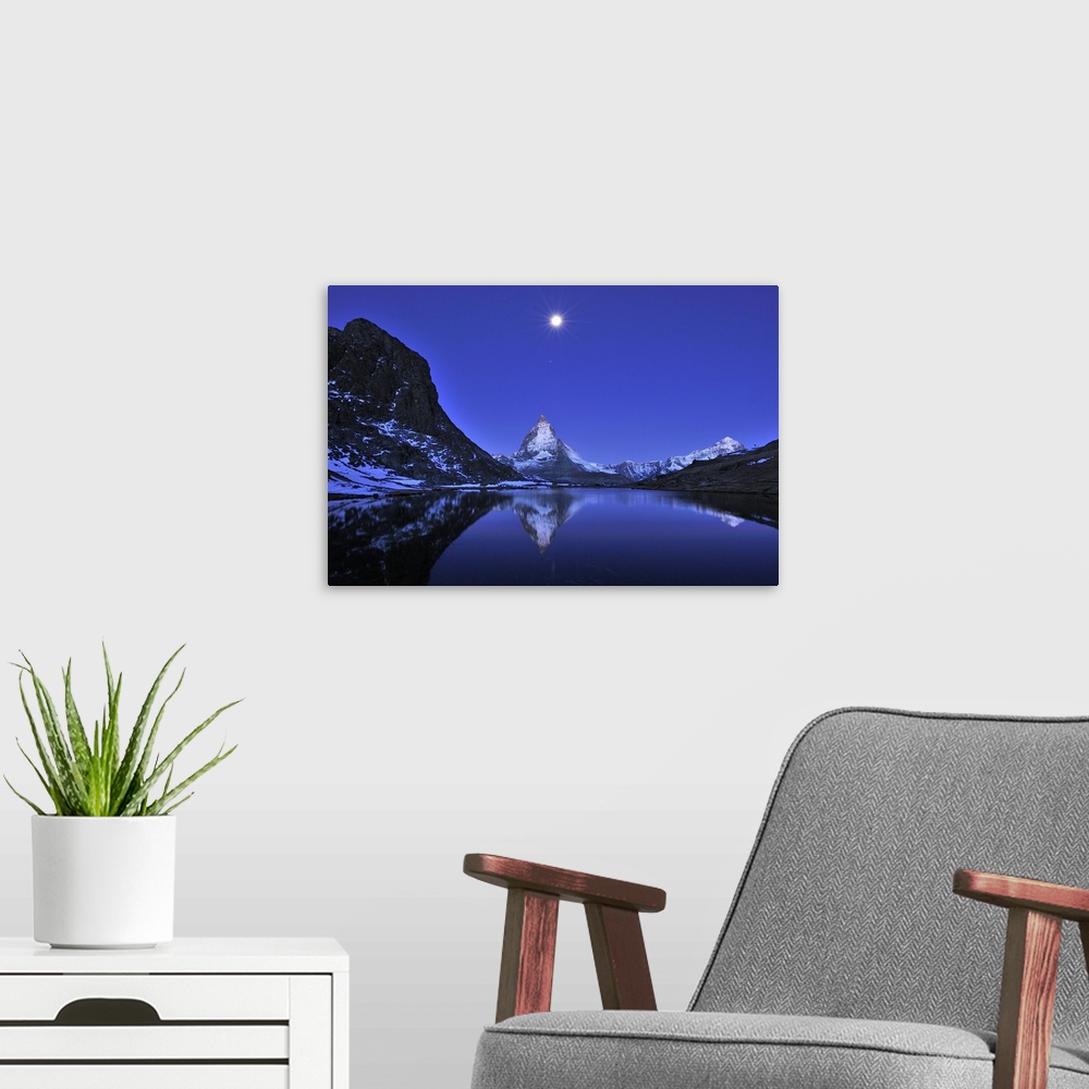 A modern room featuring Matterhorn - with reflection - Riffelsee - at night - full moon - before sunrise - Switzerland