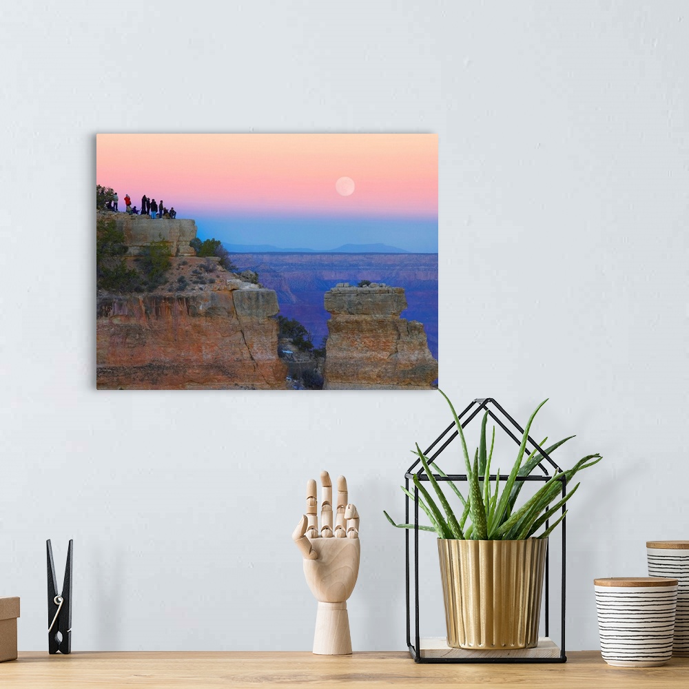 A bohemian room featuring Tourists enjoying sunset and full moon at Yaki Point, Grand Canyon, Arizona
