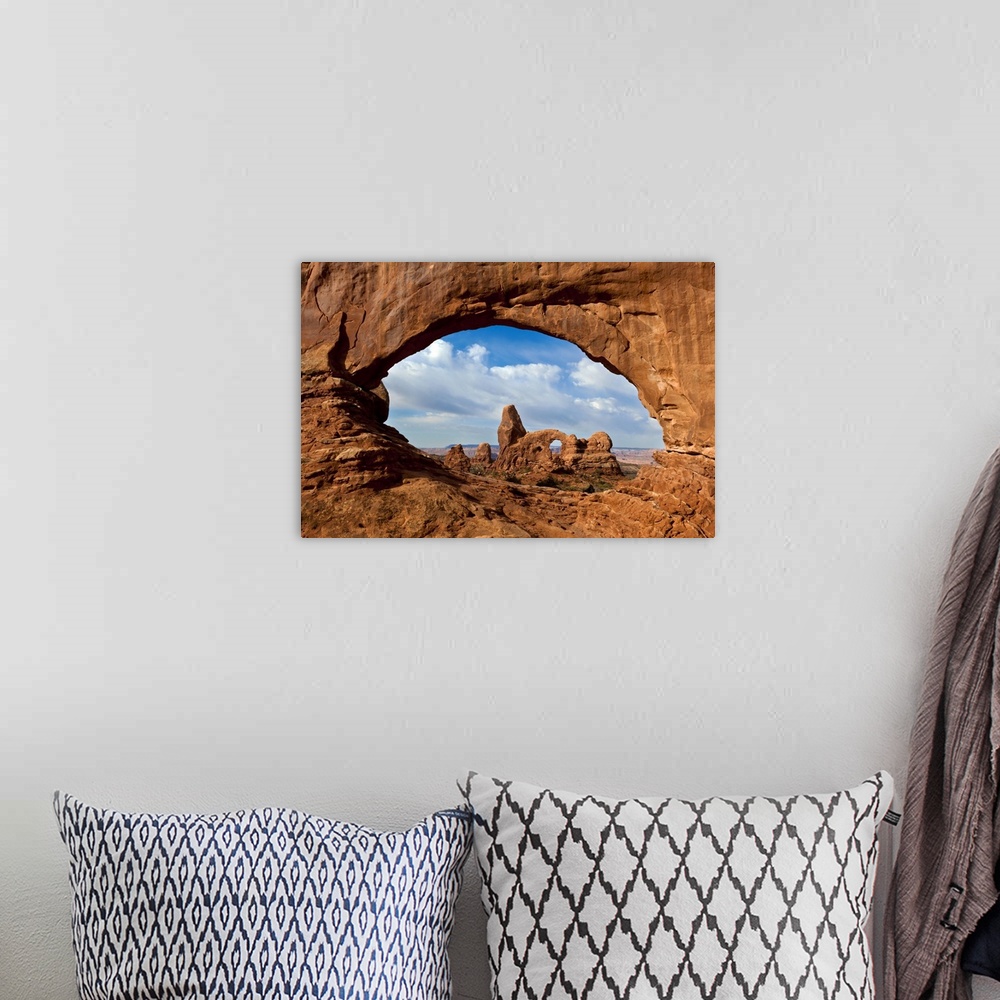 A bohemian room featuring Turret Arch through North Window Arch, Arches National Park, Utah.