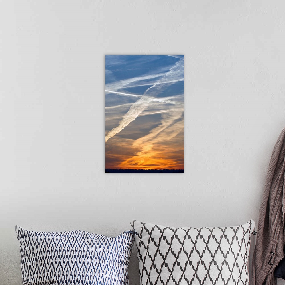 A bohemian room featuring Vapour Trails at sunset, from airliners, Germany