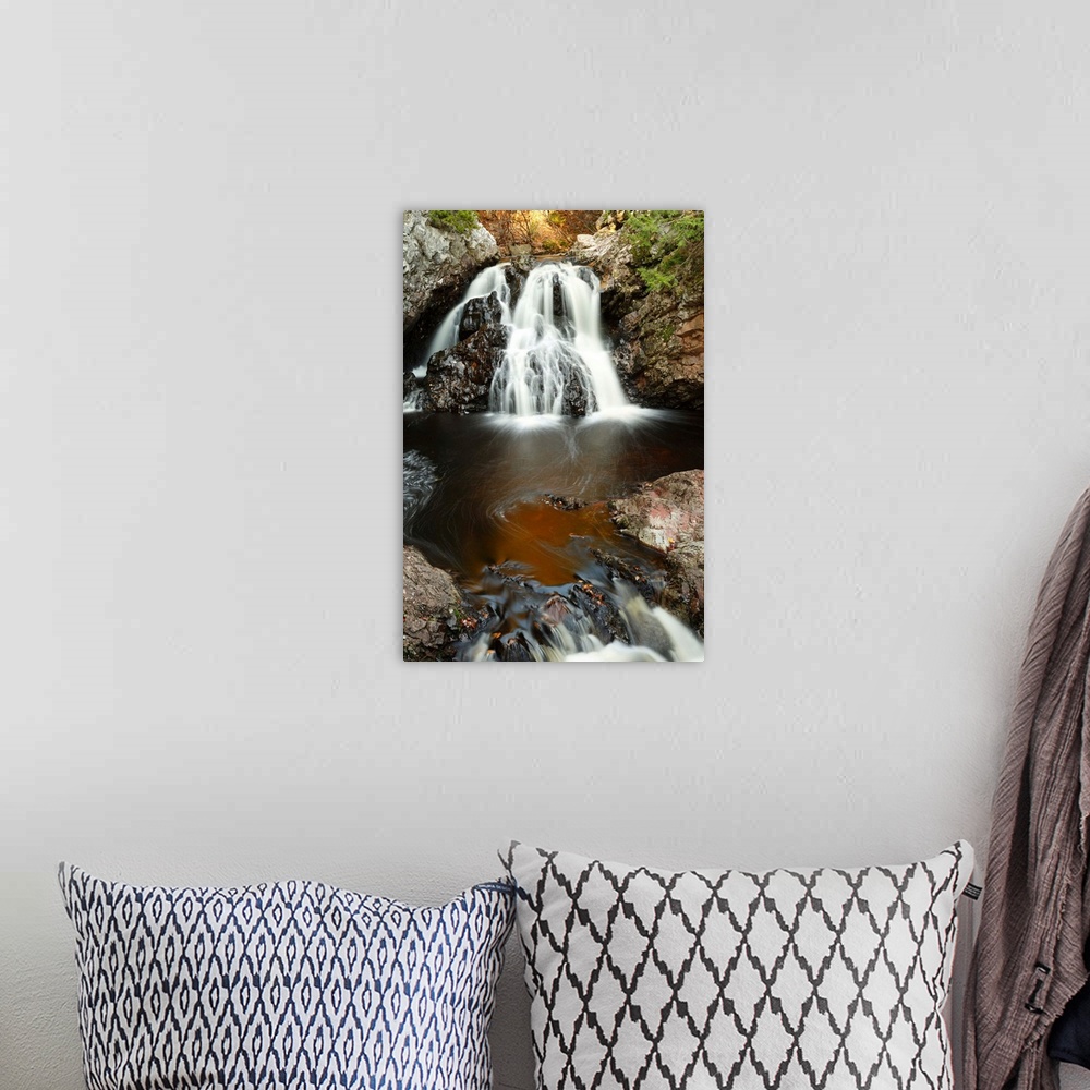 A bohemian room featuring waterfall in autumn,Nova Scotia,canada