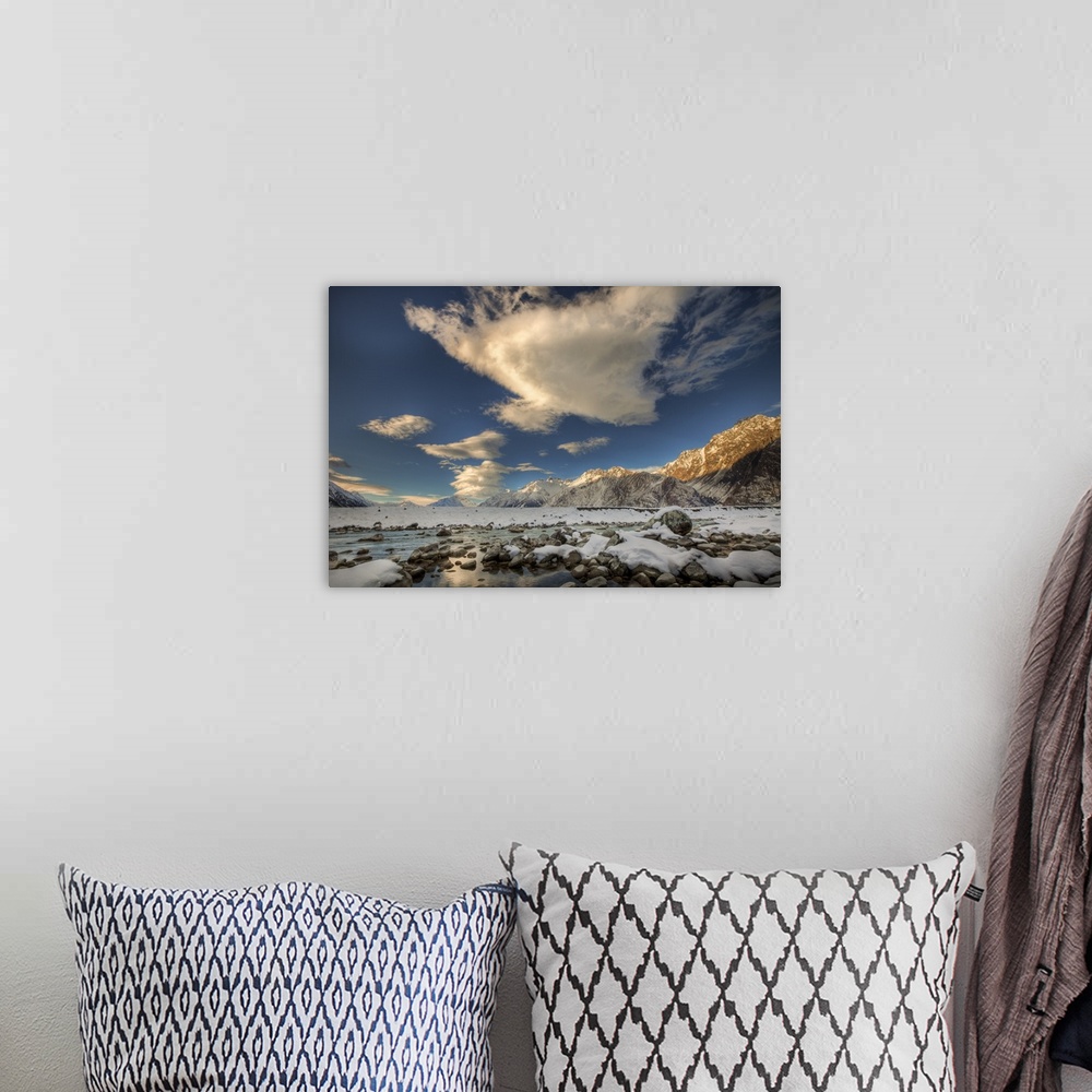 A bohemian room featuring Wind clouds over snow covered valley, Tasman Glacier, New Zealand