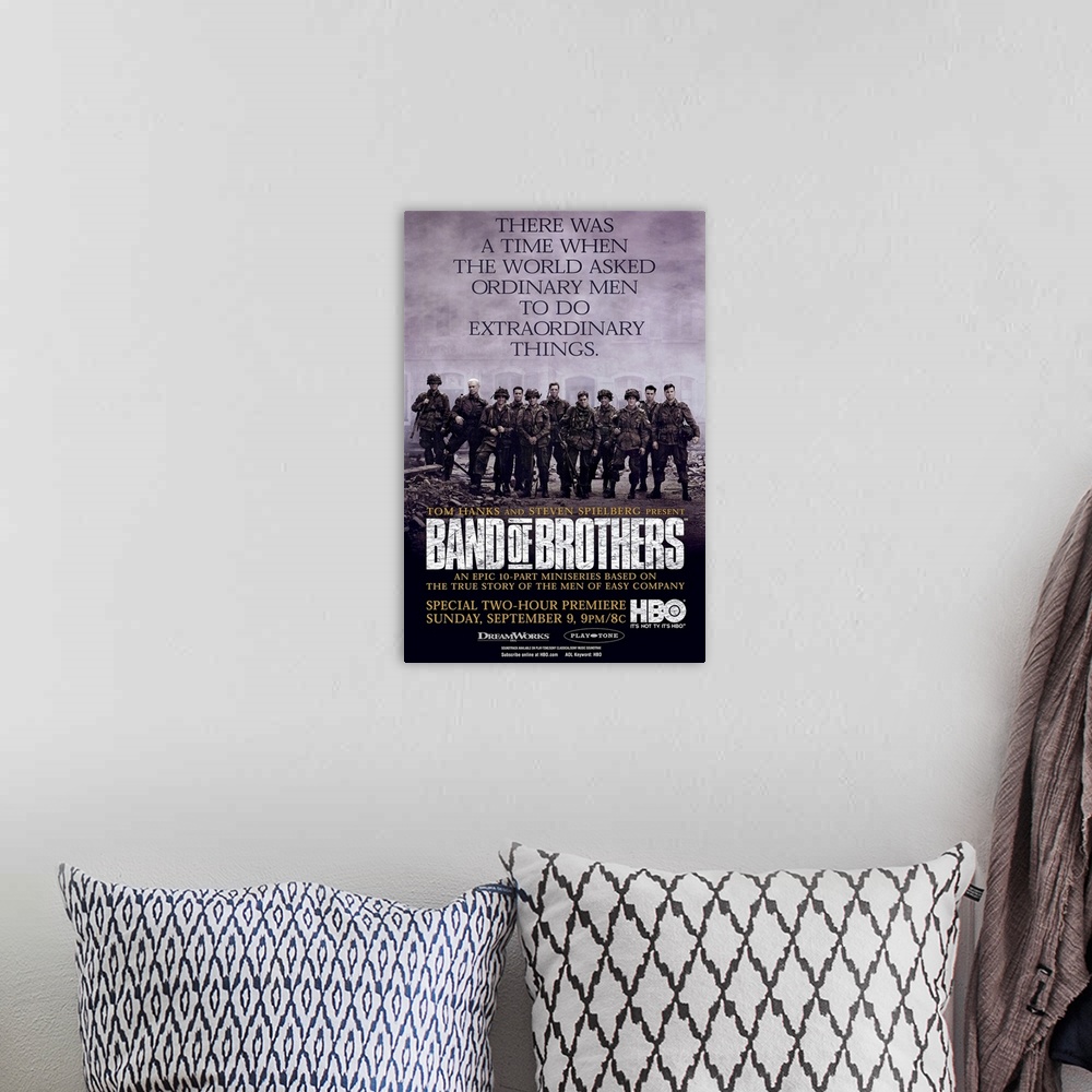 A bohemian room featuring Vertical advertisement for the miniseries, Band of Brothers, directed by Tom Hanks and Steven Spi...